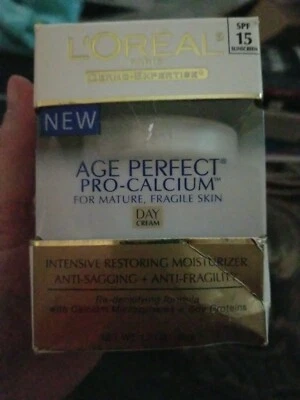 L'OREAL AGE PERFECT PRO-CALCIUM DAY CREAM 1.7oz BRAND NEW box damaged - Image 1 of 4