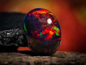 5.63 Carat Ethiopian Black Opal Cabochon 13x10x6 MM Oval Shape Welo Fire Opal - Picture 1 of 3