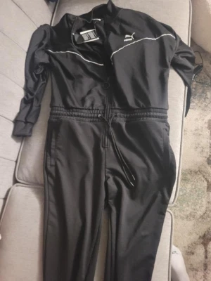 NWT Women's PUMA XTG OVERALL Jumpsuit Black Medium Track Suit Retail $110 - image 1 of 4