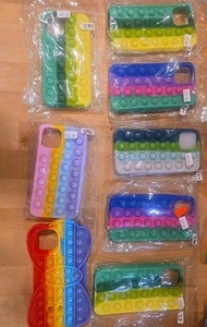 Custodie universali per cellulare Fidget Poppits. 8 totali - Foto 1 di 17