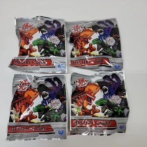 Set of 4 Bakugan Mystery Figure Blind Bags Mystery Minifigs. New - Picture 1 of 3