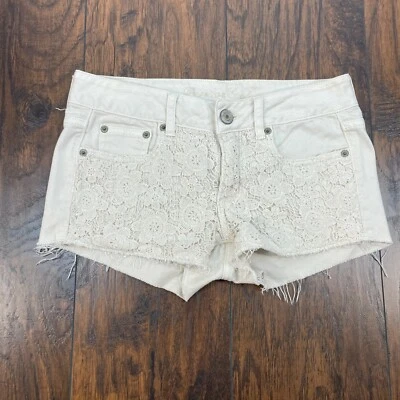2 pantalones cortos de mezclilla para mujer American Eagle marfil ganchillo encaje elástico Foto 1 de 4
