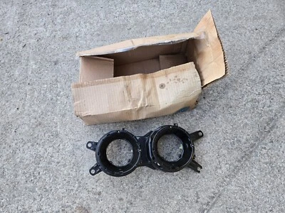 Marco de soporte de faros lado derecho BMW E23 733I 77-84 Hella 63121364356 OEM NOS Foto 1 de 4