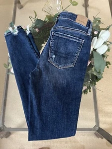 Pantalones de mezclilla elásticos para mujer American Eagle súper tiro alto Jegging Destroy talla 2 - Imagen 1 de 17