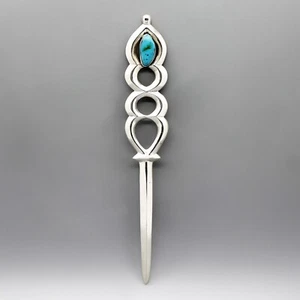 APRILETTERA IN TUFO VINTAGE NAVAJO ARGENTO STERLING E TURCHESE di JIMMY CONE - Foto 1 di 4