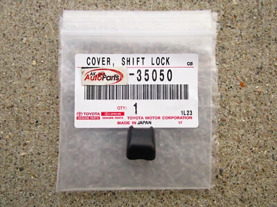 ПОДХОДИТ: 95 - 04 TOYOTA TACOMA A/T ПЕРЕКЛЮЧАТЕЛЬ ЗАМОК СПУСК КНОПКА КРЫШКА OEM НОВЫЙ - Изображение 1 из 4