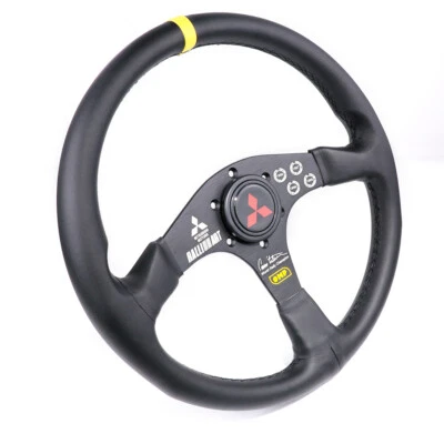 Volante deportivo plano de cuero genuino de 14 pulgadas para buje Mitsubishi Fit MOMO NRG Foto 1 de 4