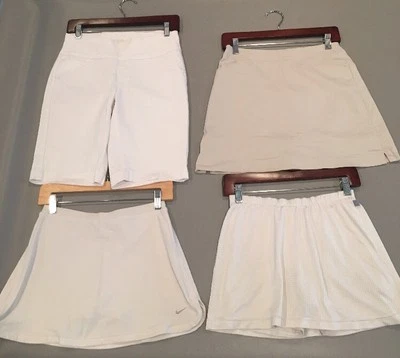 Pantalón corto de golf Nike Fit Dry beige para mujer 2 Foto 1 de 4