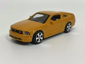 2006 Ford Mustang GT Orange 1:43 Scale Burago 183000 - Picture 1 of 6