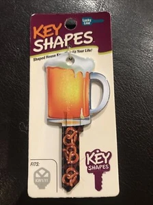Beer shape Kwikset house key blank. - Picture 1 of 2