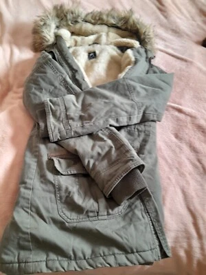 green warm parka,fully fleece lined and hooded size 10 - Image 1 of 4