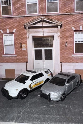 Lot Of 2 Matchbox Ford Interceptor SUV & Custom Silver Interceptor Sedan Diecast - Image 1 of 4