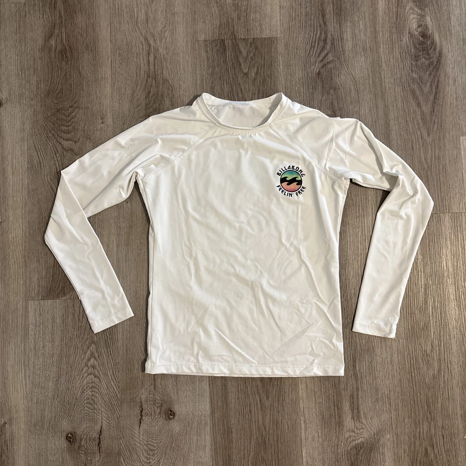 Camisa Top Billabong Youth Arch Wave Manga Larga Blanca “Sentirse Libre” Surf Foto 1 de 4