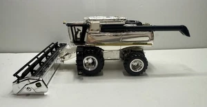 1/64 Ertl John Deere 9860 STS Combine Silver chrome - Picture 1 of 4
