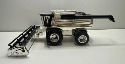1/64 Ertl John Deere 9860 STS Combine Silver chrome - Image 1 of 4