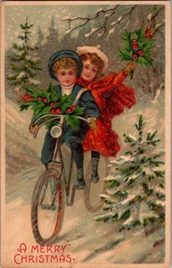 AK Frohe Weihnachten Kinder fahren Fahrrad Schnee geteilt hinten geprägt 1907 - Bild 1 von 2