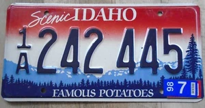 Idaho 1997 Nummernschild 1A 242 445 rot weiß und blau Berge hohe Kiefer - Bild 1 von 4