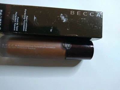 BECCA Aqua Luminous Perfecting Foundation Deep Bronze 30ml 1.0 Fl Oz New - Image 1 of 4