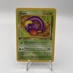 1999 Ekans 46/62 Fossil-1st Edition Regular - Picture 1 of 4