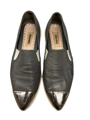 Miu Miu Flats Women’s Size 7 Black Leather Silver Metal Cap Toe Slip-On Loafers - Image 1 of 4