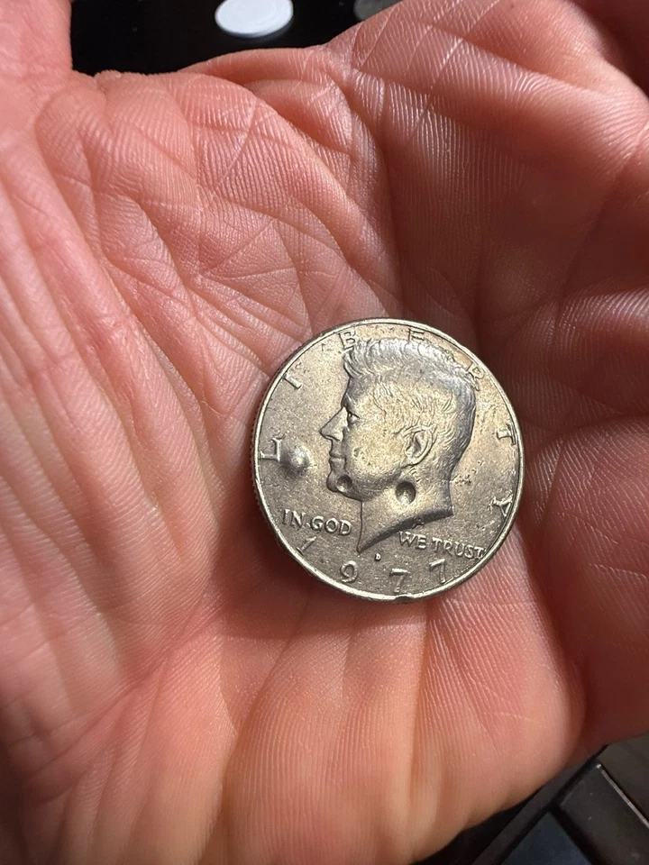 1977 D Half Dollar Significant Strike Through Error - Image 1 of 2