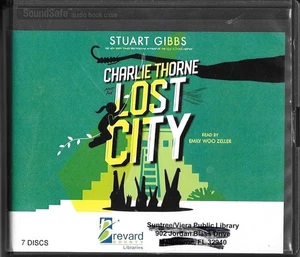 Audio Book CHARLIE THORNE LOST CITY by Stuart Gibbs on 7 Discs - Imagen 1 de 1