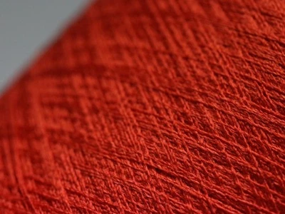 M34 (129€/kg) 100g DRAGON COMFORT SEIDE - SILK MAGMA (26) Zwirn Stretch Wolle - Bild 1 von 3