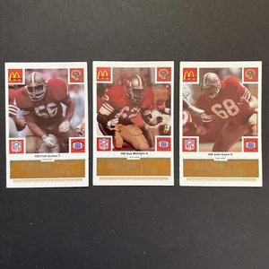 🏈 1986 MCDONALDS FOOTBALL CARD LOT OF 3 49ERS W/ ORANGE TAB AYERS QUILLAN - Bild 1 von 4
