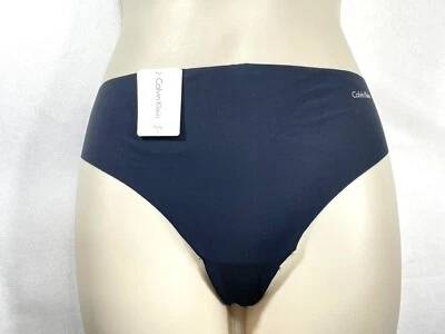 Nuevo con etiquetas Calvin Klein Mujer L Invisibles Tanga Ropa Interior D3428 Negro Foto 1 de 4
