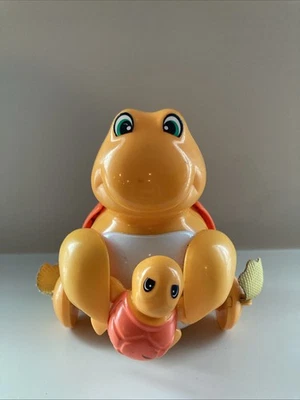 Vintage 1989 TOMY Mother and Baby Orange Turtles Pull String Toy-Works - Image 1 of 3