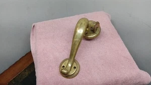 Heavy solid brass door pull with thumb Release. 8 1/2 inches long. - Picture 1 of 4