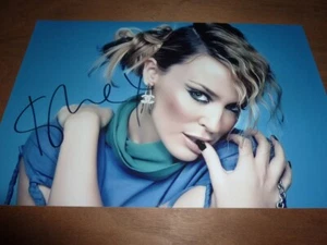 KYLIE MINOGUE signed 12X8 photo + COA - Foto 1 di 2
