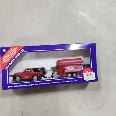 SIKU 2010 OPEL FRONTERA TURISMO COCHE COLGANTE CABALLO CON CAJA PARA CABALLOS COMO NUEVO EN CAJA C17 Foto 1 de 3