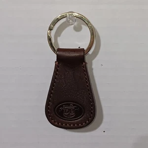 New Dooney & Bourke Leather Keychain Donegal Crest Brown NWOT - Picture 1 of 3