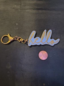 HELLO KEYCHAIN PURPLE WITH GOLD TONE LETTERING KEYCHAIN - Picture 1 of 2
