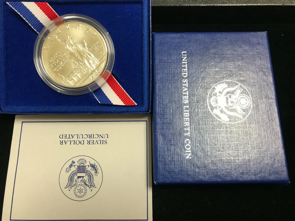 1986 Liberty Silver Dollar "Ellis Island" UNC Silver Dollar W/ Box & COA - Image 1 of 1