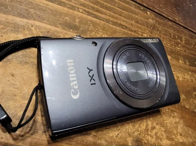 Canon IXY 160 fotocamera digitale argento GIAPPONE inglese OK testata - Immagine 1 di 4