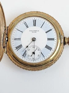 Antiguo reloj de bolsillo Columbia para damas tono dorado funciona muy bien, tira de la lengüeta para ajustar la hora - Imagen 1 de 13