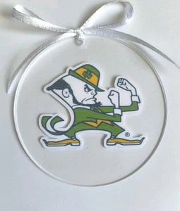 Ornamento Universitario Notre Dame Transparente Fútbol NCAA  - Imagen 1 de 2