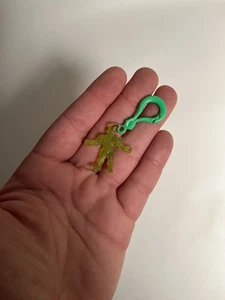 Vntg Exogini MUSCLE Kinkeshi Lime Green Yellow Keychain Rubber HTF Man Charm Toy - Picture 1 of 2