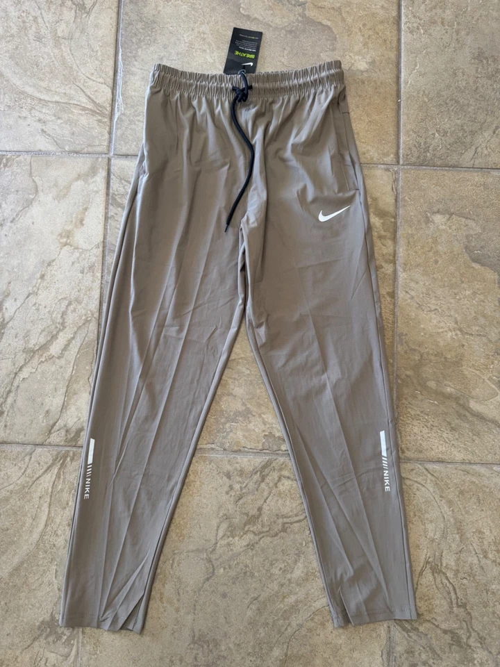 NIKE JOGGER PANTS WITH POCKETS MENS SIZE M - Image 1 of 2