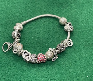 STERLINGSILBER PANDORA MOMENTS ARMBAND MIT 11 CHARMS 2 CLIPS GEBRAUCHT 19 CM 19 CM - Bild 1 von 2