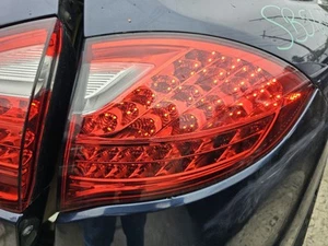 2011-2014 PORSCHE CAYENNE PASSENGER SIDE TAIL LIGHT (QTR MTD) - Picture 1 of 12
