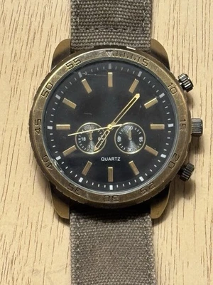 Reloj de cuarzo Accutime 8868WM para hombre caja de bronce correa de lona - funciona Foto 1 de 4