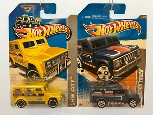 Hot Wheels BUNDLE OF (2) Armored Truck HW Blue Vid Series & HW City Yellow - Picture 1 of 7