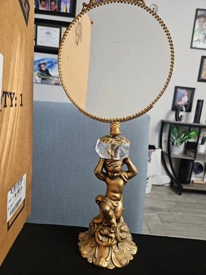 Espejo tocador vintage querubín Hollywood Regency dorado con cristal de vidrio Foto 1 de 3