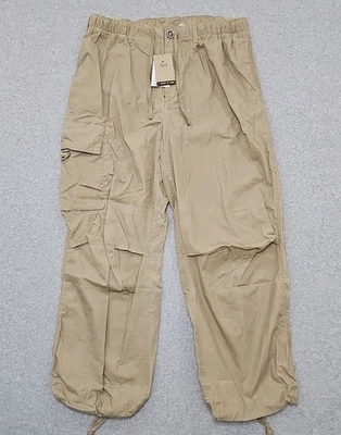 Calça Nike Sportswear Tech Pack lona encerada cargo bege tamanho GG masculina - Imagem 1 de 4