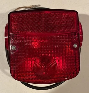 NOS 1977 1978 1979 Suzuki TS185 TS250 NOS Taillight Lamp Assembly 35710-30512 - Picture 1 of 8