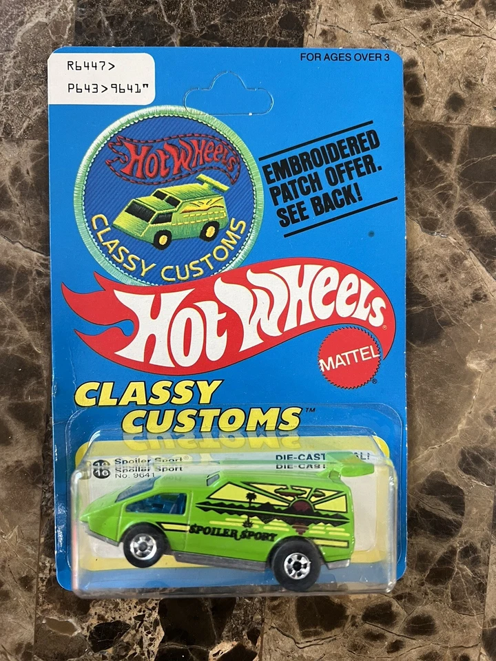 Tarjeta de parche Hot Wheels 1977 sin usar, en caja, Spoiler Sport “Classy Customs” ventana trasera dividida Foto 1 de 3