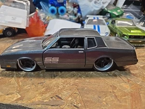 Maisto 1986 Monte Carlo SS 1/24 Diecast Dark Grey With Missing Steering Wheel - Picture 1 of 24